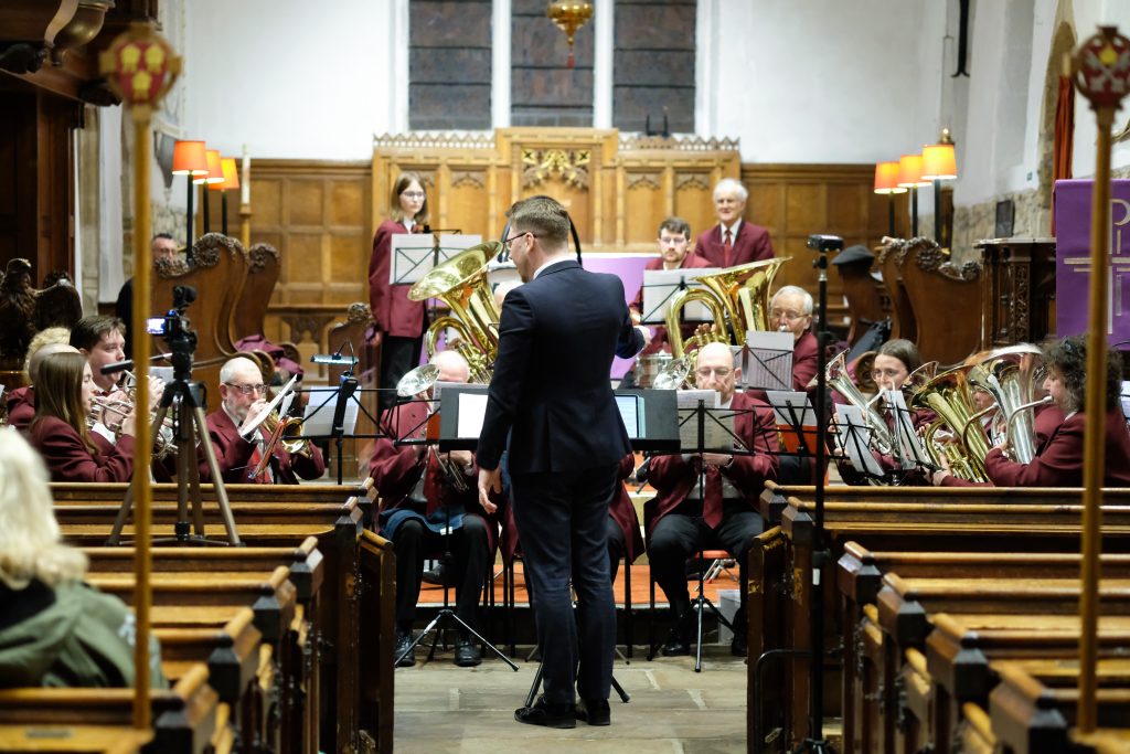 Easingwold Town Band being conducted